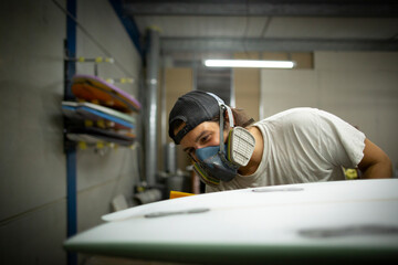 Fototapeta premium shaper modeling a new surf board