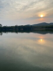 Lake view in the evening, sunset over mountain.  Concept about relax and comfort.