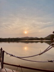Fototapeta premium Lake view in the evening, sunset over mountain. Concept about relax and comfort.