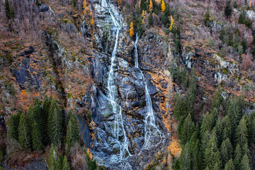 Beautiful Waterfall Vallesinella in Madonna di Campiglio in the autumn time, National Park Adamello-Brenta Italy ,Trentino Dolomite Alps