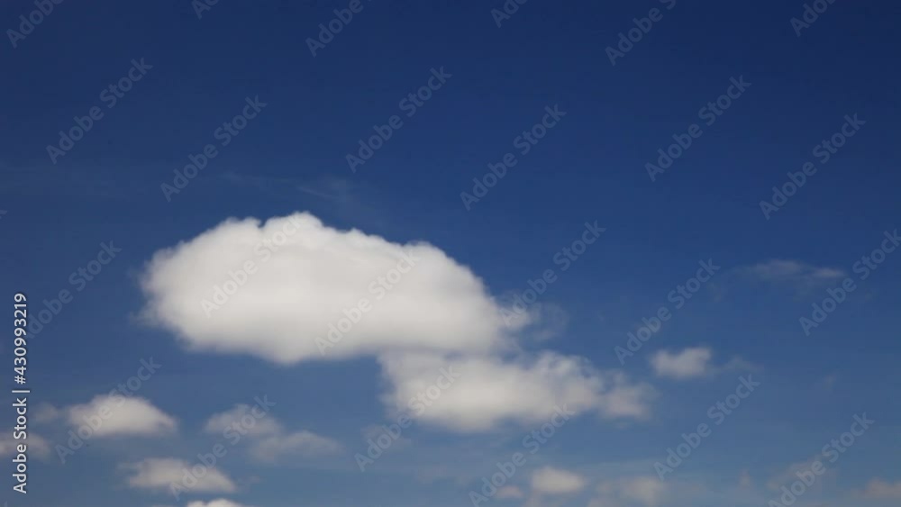 Wall mural the texture of the blue sky with the change of cumulus clouds to cirrus. change in weather. natural 