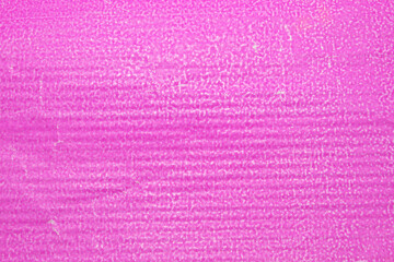 hot pink textured packaging paper closeup