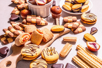Assorted various cookies and muffins