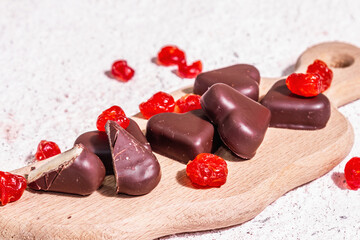 Heart-shaped chocolate candies with dried cherries