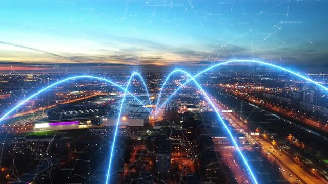 AERIAL. Glowing lines connected in the center of the city's footage. Futuristic concept. 