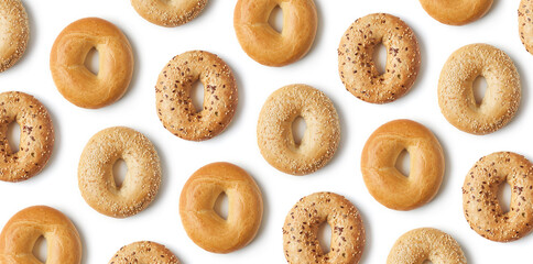Fresh bagel pattern isolated on white, from above
