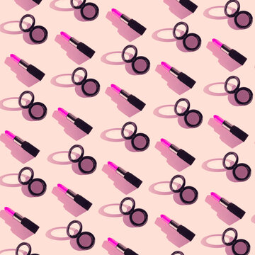 Creative pattern made of bright pink lipsticks and eyeshadows on pastel background. Cosmetic and makeup concept. Beauty and fashion theme. Top view. Flat lay