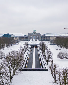 Aerial view of the Tunnel of Cinquantenaire with the Arcade du Cinquantenaire in background at wintertime, a stately triple arch monument, Brussel, Belgium.