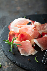Pieces of prosciutto or jamon close up