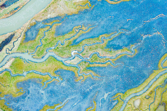 Aerial view of the abstract pattern made by Scheldt river estuaries near Belgium and The Netherlands border, Nieuw-Namen, Zeeland, The Netherlands.