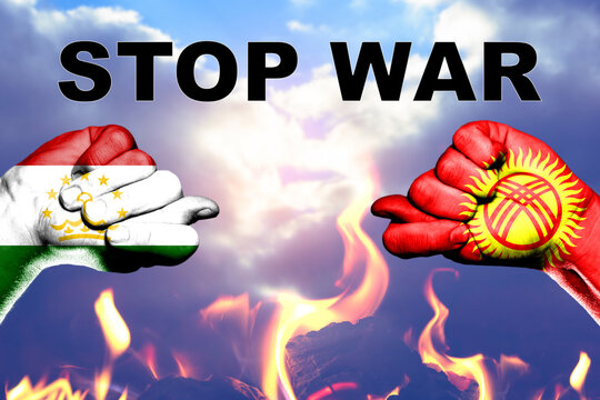 Trade and military conflict between Tajikistan and Kyrgyzstan. Conceptual photo of two fists with figs isolated on a white background. Stop war.