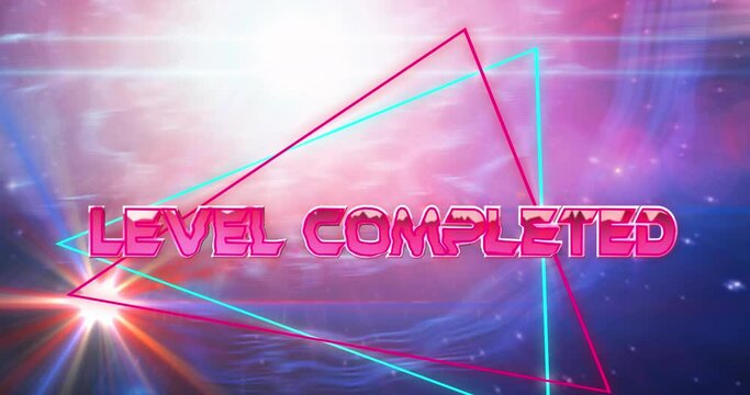 Animation of level completed text in metallic letters on pink and blue triangles and universe