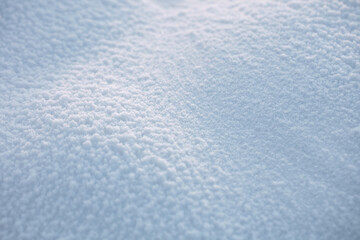 Beautiful texture of snow. Beautiful sunlight shows the texture and details of the snow