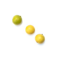 group of lemons and limes on white background