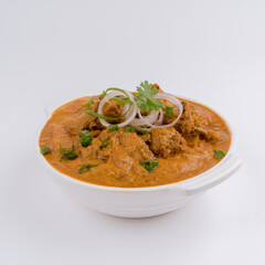 murga musallam or mutton masala in a white bowl on white background 