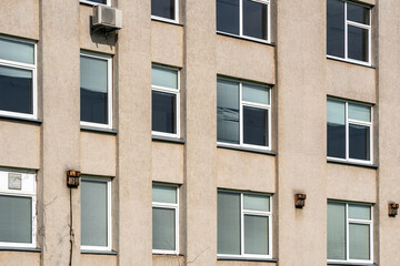 Windows of abandoned office building