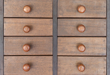 Wooden cabinet with several drawers