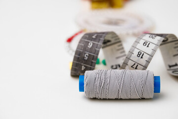 Sewing accessories isolated on white background close up
