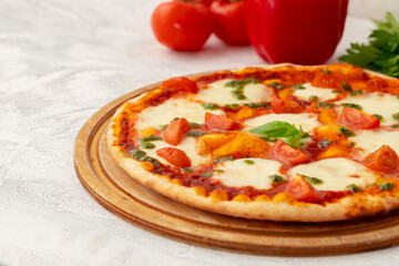 Freshly baked pizza on table close up