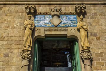 Architectural fragments of old Hospital Holy Cross and Saint Paul (Sant Pau i de la Santa Creu) building built in early 15th century and served as a hospital for more than 500 years. Barcelona, Spain.