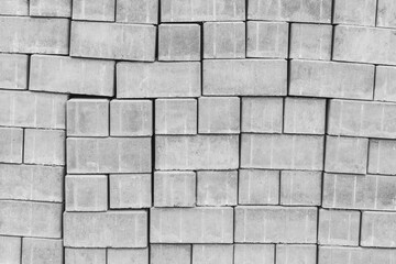 A pile of new paving stone slabs texture background. Building tiled materials at the construction site