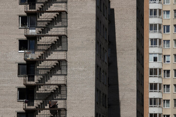 Walls of a typical old hostel and wall modern house (Saint Petersburg, Russia)