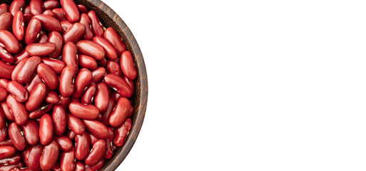 Top view of Kidney beans in wooden bowl on white background, copy space