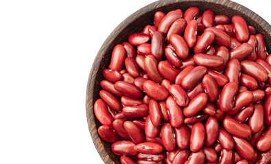 Top view of Kidney beans in wooden bowl on white background, copy space