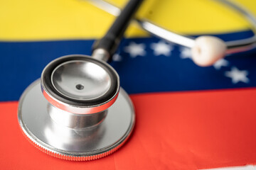 Black stethoscope on Venezuela flag background, Business and finance concept.