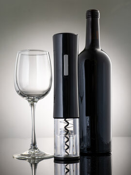 Open A Wine Bottle With An Electric Corkscrew Automatically