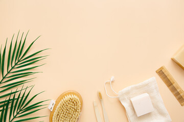 Eco-friendly background, frame of bath accessories: wood and natural bristle brushes, bamboo ear sticks, organic soap, pumice. Zero waste concept. Copy space.