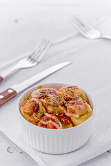 Mini pizza with sausage and cheese