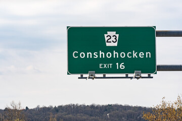 Interstate highway 476 exit 16 sign for route 23 and Conshohocken Pennsylvania