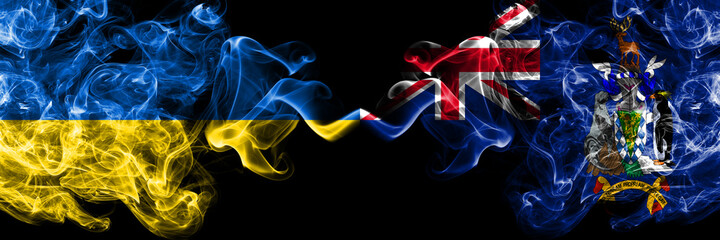 Ukraine, Ukrainian vs British, Britain, South Georgia and the South Sandwich Islands smoky mystic flags placed side by side. Thick colored silky abstract smokes flags.