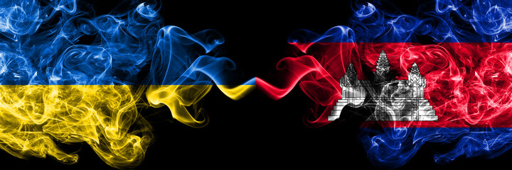 Ukraine, Ukrainian vs Cambodia, Cambodian, Khmer smoky mystic flags placed side by side. Thick colored silky abstract smokes flags.