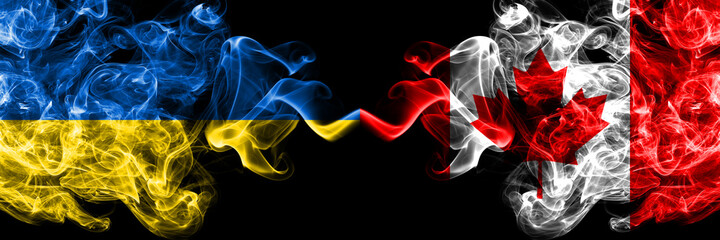 Ukraine, Ukrainian vs Canada, Canadian smoky mystic flags placed side by side. Thick colored silky abstract smokes flags.