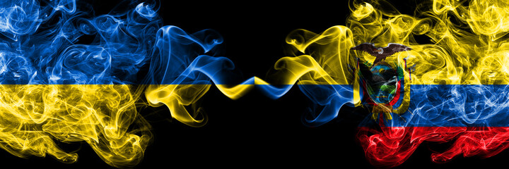 Ukraine, Ukrainian vs Ecuador, Ecuadorian smoky mystic flags placed side by side. Thick colored silky abstract smokes flags.