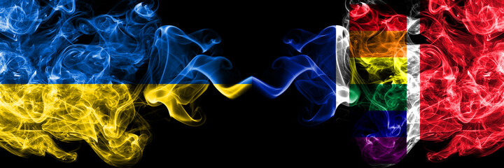 Ukraine, Ukrainian vs France Gay flag smoky mystic flags placed side by side. Thick colored silky abstract smokes flags.