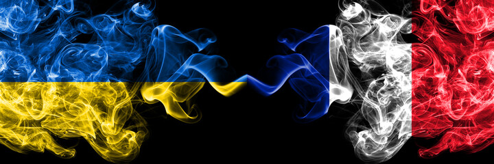 Ukraine, Ukrainian vs France, French smoky mystic flags placed side by side. Thick colored silky abstract smokes flags.