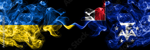 Ukraine, Ukrainian vs France, French Southern and Antarctic Lands smoky mystic flags placed side by side. Thick colored silky abstract smokes flags.