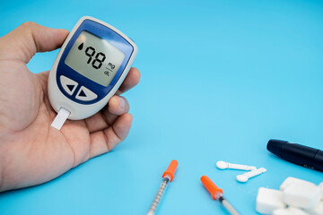 Diabetes monitors blood sugar levels, men use a lancele