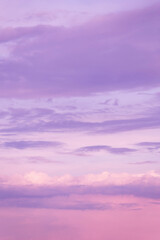 Dramatic sunrise, sunset purple pink violet blue sky with clouds abstract background texture
