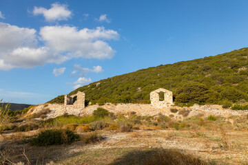 Fototapeta na wymiar Ruins of house at the ancient Paros marble quarries, Greece.