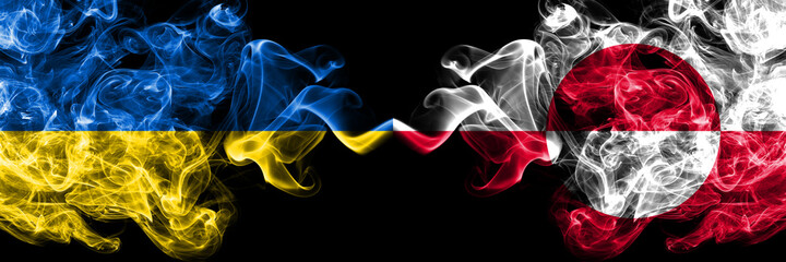 Ukraine, Ukrainian vs Greenland, Denmark, Danish smoky mystic flags placed side by side. Thick colored silky abstract smokes flags.