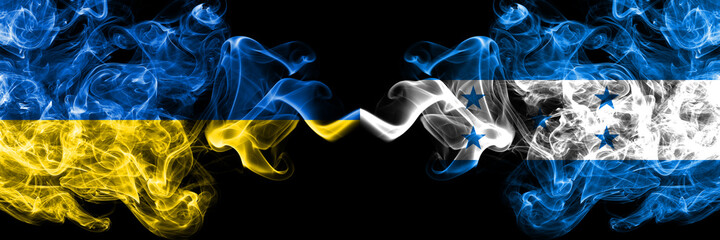Ukraine, Ukrainian vs Honduras, Honduran smoky mystic flags placed side by side. Thick colored silky abstract smokes flags.