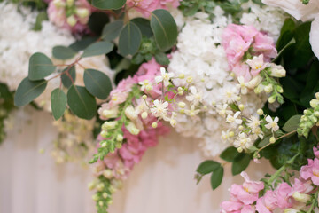 Main table at a wedding reception with beautiful fresh flowers