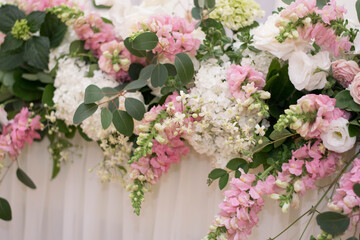 Main table at a wedding reception with beautiful fresh flowers
