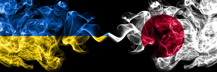Ukraine, Ukrainian vs Japan, Japanese smoky mystic flags placed side by side. Thick colored silky abstract smokes flags.