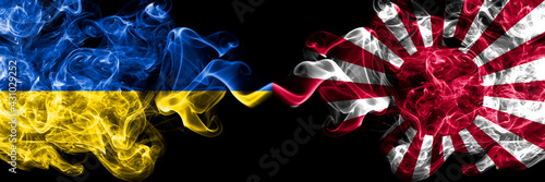 Ukraine, Ukrainian vs Japan, Japanese, sun smoky mystic flags placed side by side. Thick colored silky abstract smokes flags.