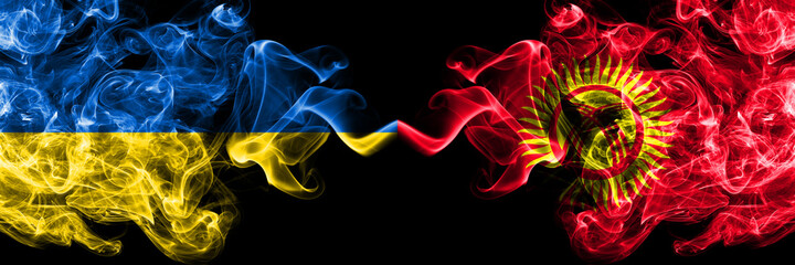 Ukraine, Ukrainian vs Kyrgyzstan smoky mystic flags placed side by side. Thick colored silky abstract smokes flags.
